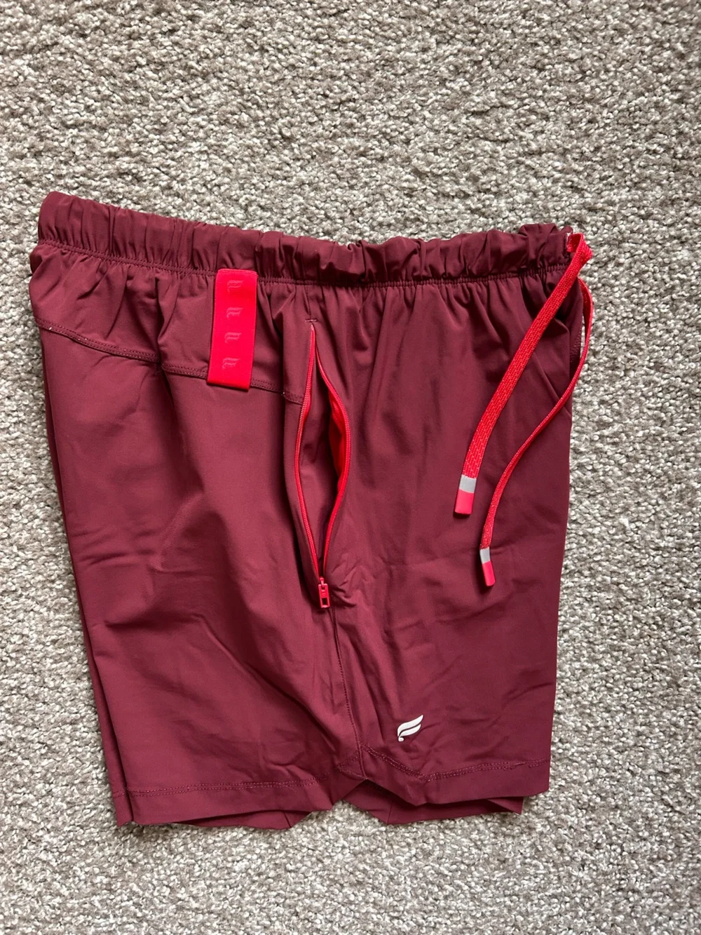 Fabletics men’s size XS Maroon Athletic Drawstring lined Shorts with Red Accent